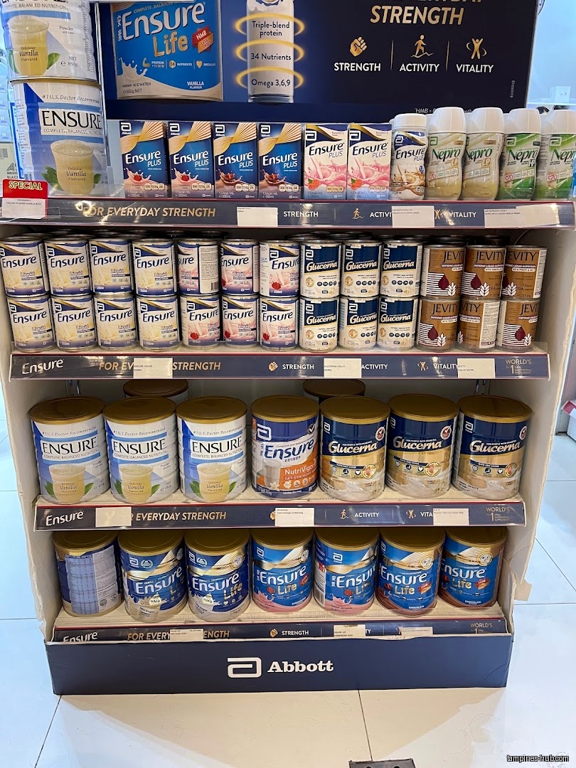 A shelf displays various Ensure and Glucerna nutritional supplement products in a store.