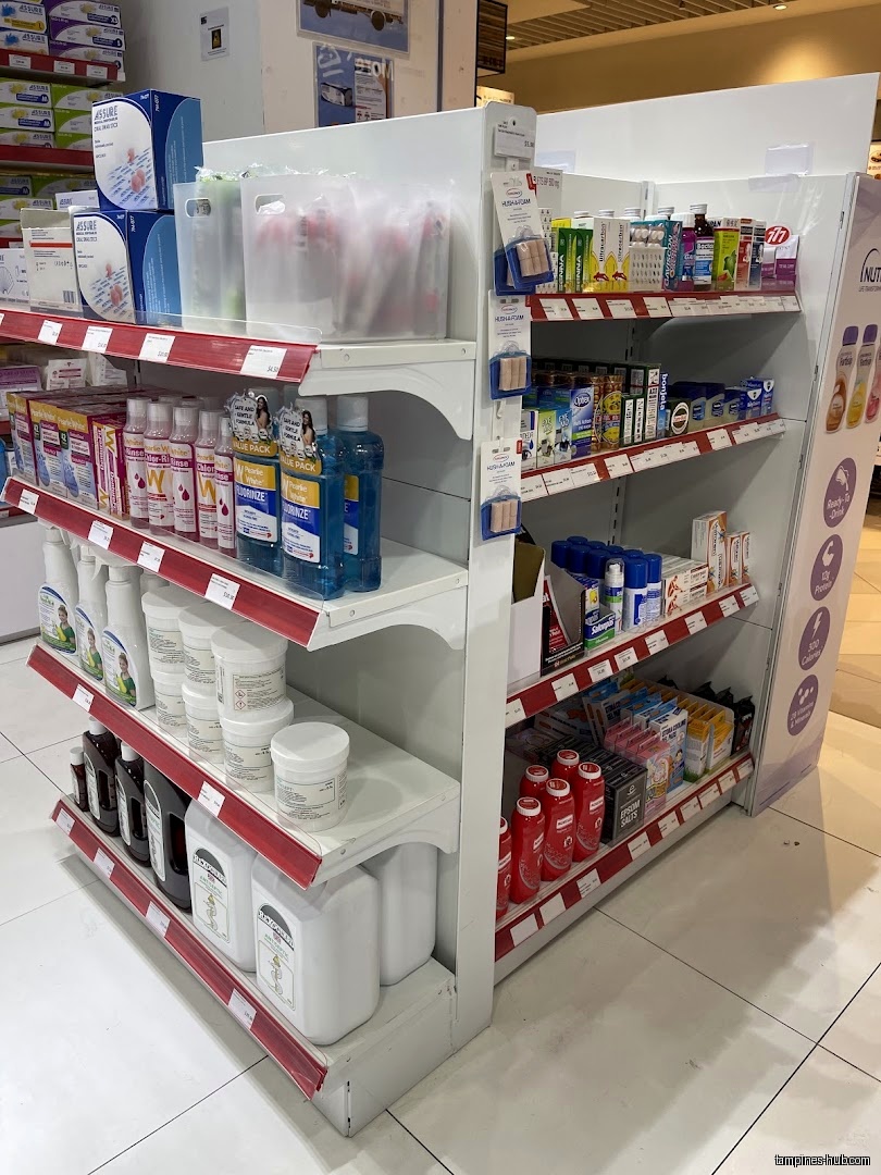 Shelves stocked with various healthcare and pharmaceutical products inside Pharmex Healthcare.