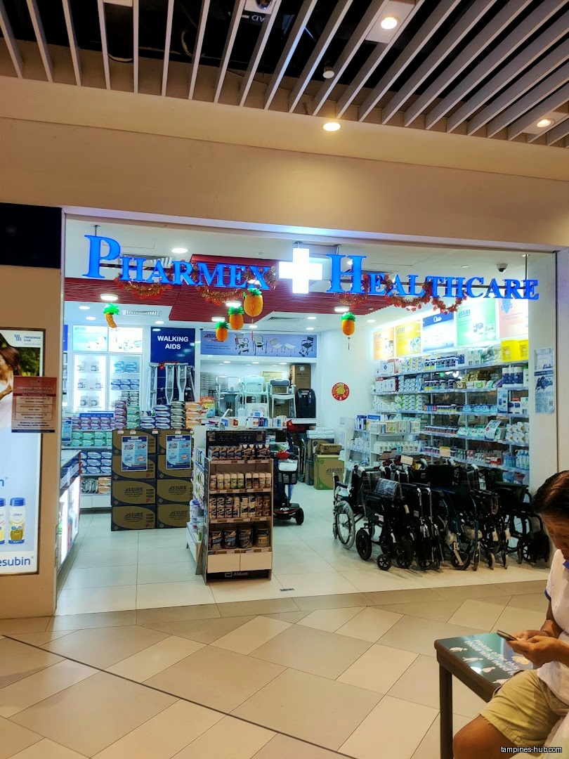 The Pharmex Healthcare shop front displays products like wheelchairs and walking aids.