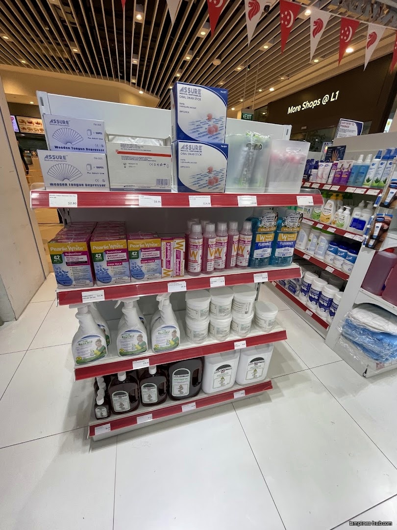 Shelves stocked with various healthcare products inside Pharmex Healthcare.