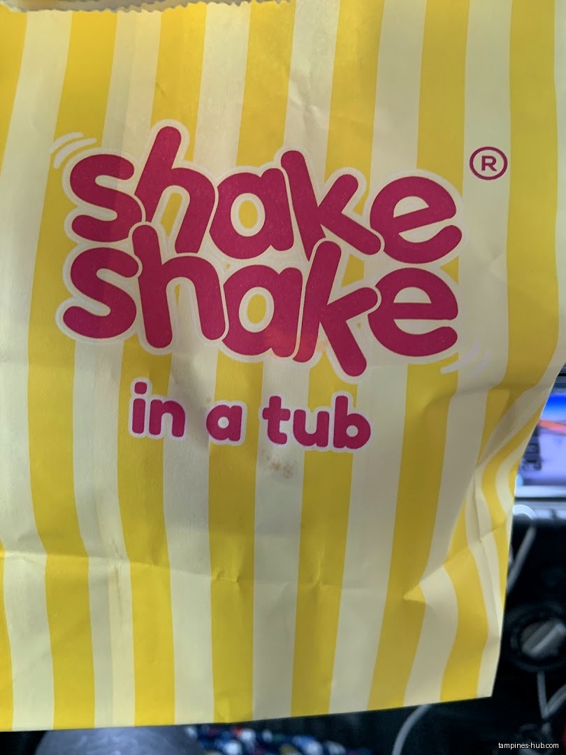 A yellow and white striped bag with the logo "Shake Shake in a tub".