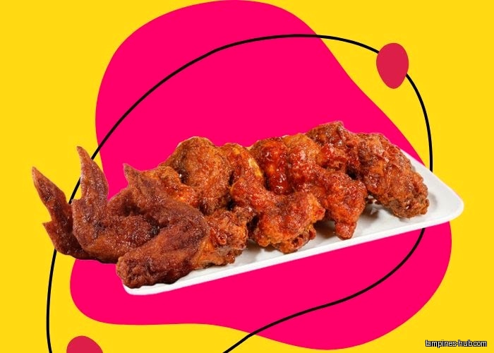 A plate of fried chicken wings on a colorful background.
