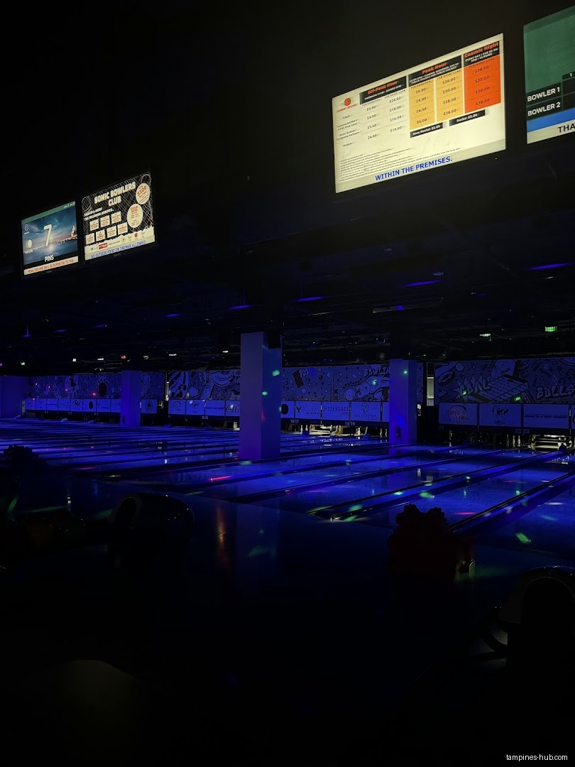 Interior view of Sonic Bowl with bowling lanes and digital displays.