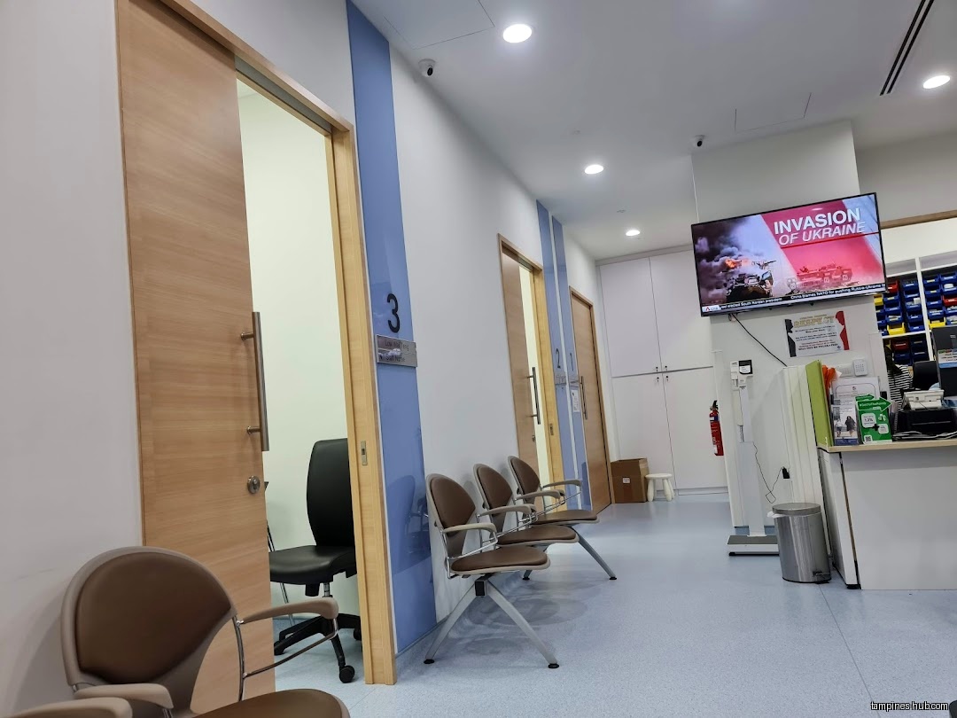 The image shows the interior waiting area of Tampines Family Medicine Clinic.