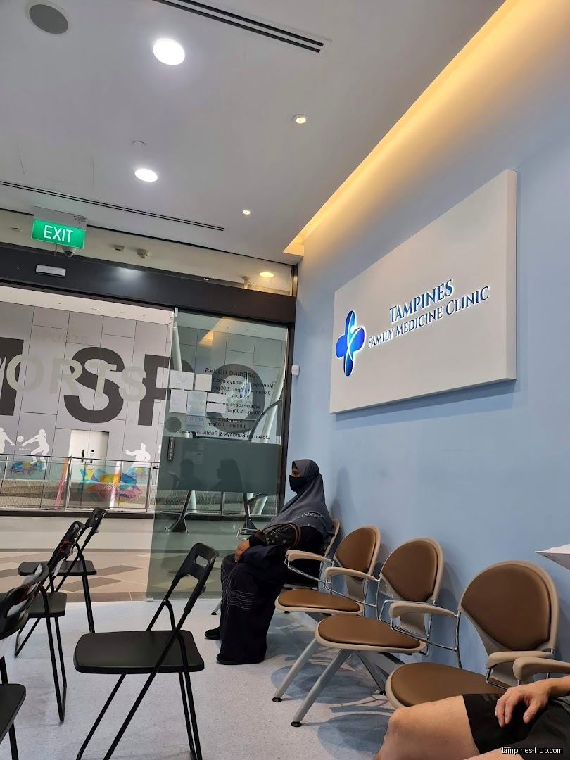 Waiting area inside Tampines Family Medicine Clinic with seated patients.