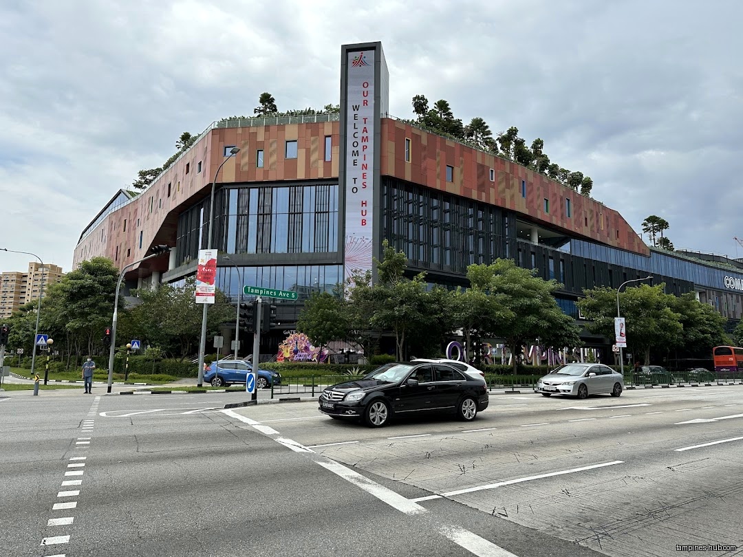 The Tampines Regional Library building is viewed from across the street.