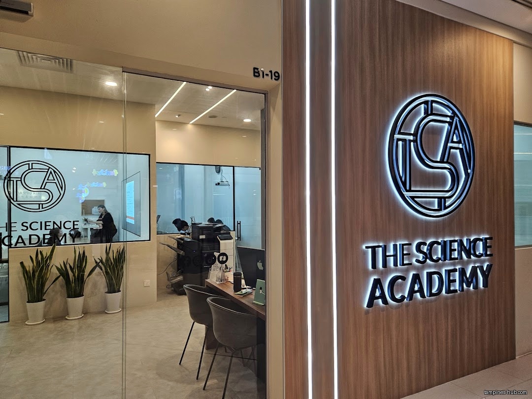 The image shows the entrance to TSA THE SCIENCE ACADEMY.