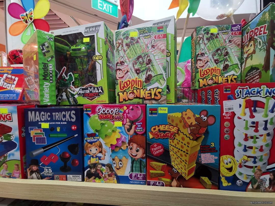 A shelf displays various toys and games, including Looping Monkeys and Magic Tricks.