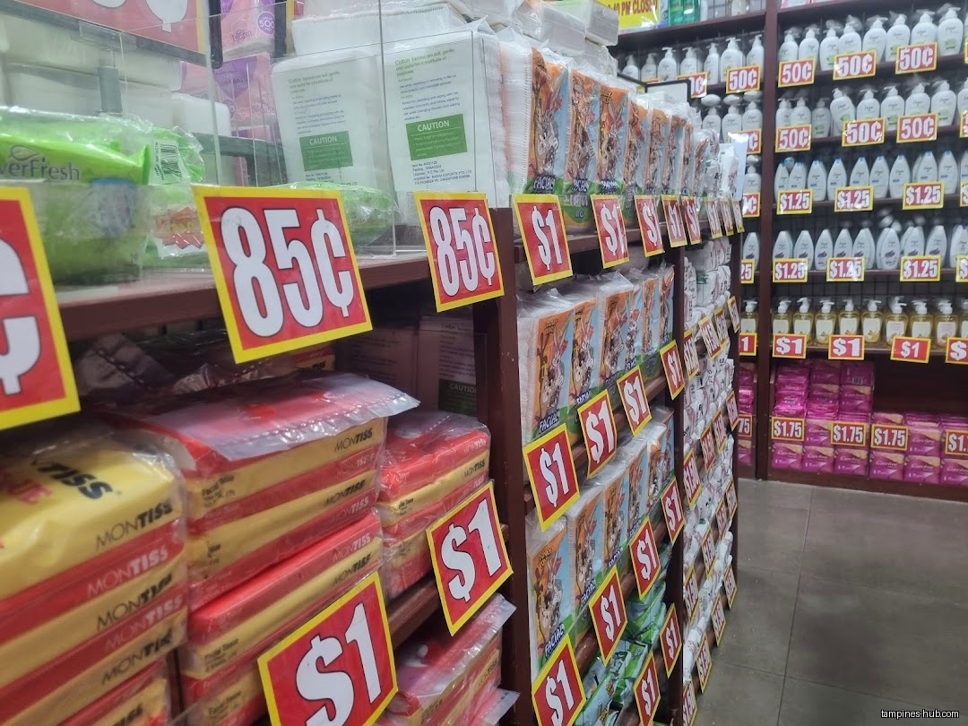 Aisles of products with price tags are displayed in the Valu$ store.