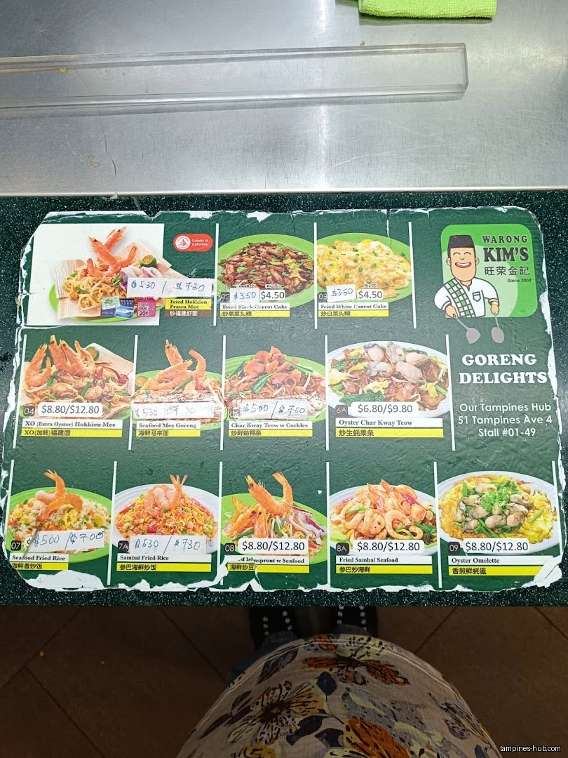 The image shows a menu board for Warong Kim's Goreng Delights.