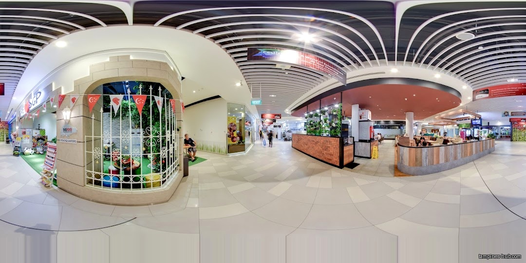 Interior view of a shopping mall with the 'We Love SGP' shop.