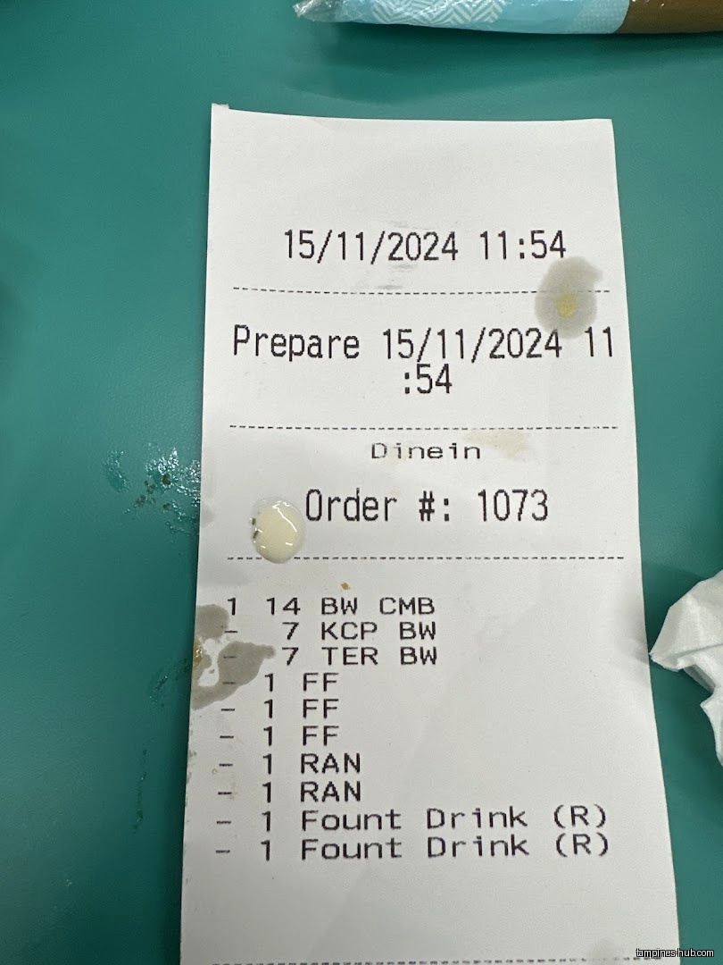 A receipt from Wingstop Our Tampines Hub shows a dine-in order.