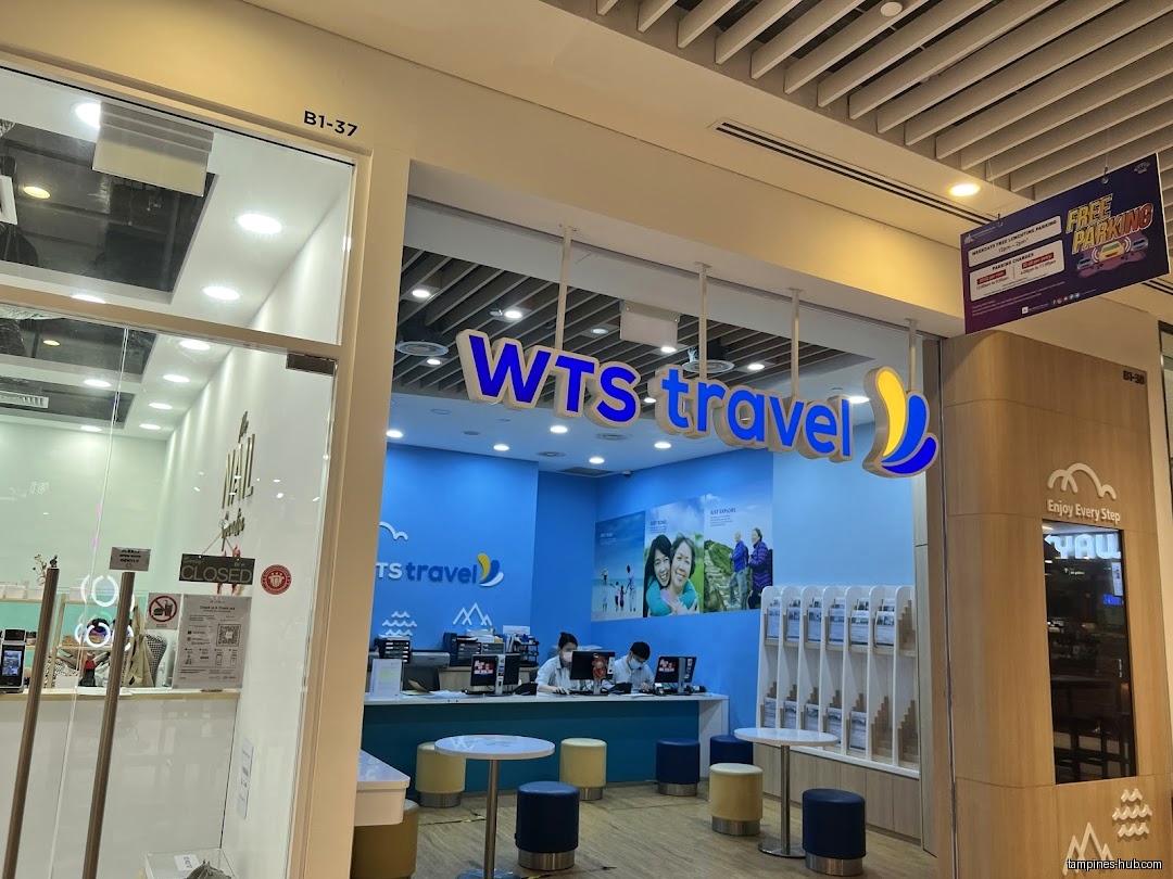 The image shows the storefront of WTS Travel & Tours Pte Ltd.
