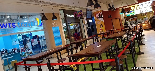 The image shows the shop front of WTS Travel & Tours Pte Ltd.