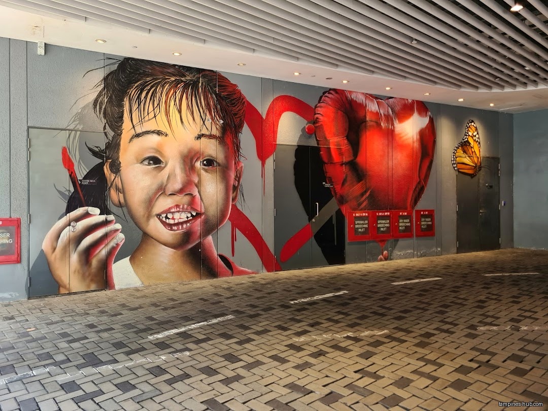 The image shows a mural of a child and a heart-shaped balloon.