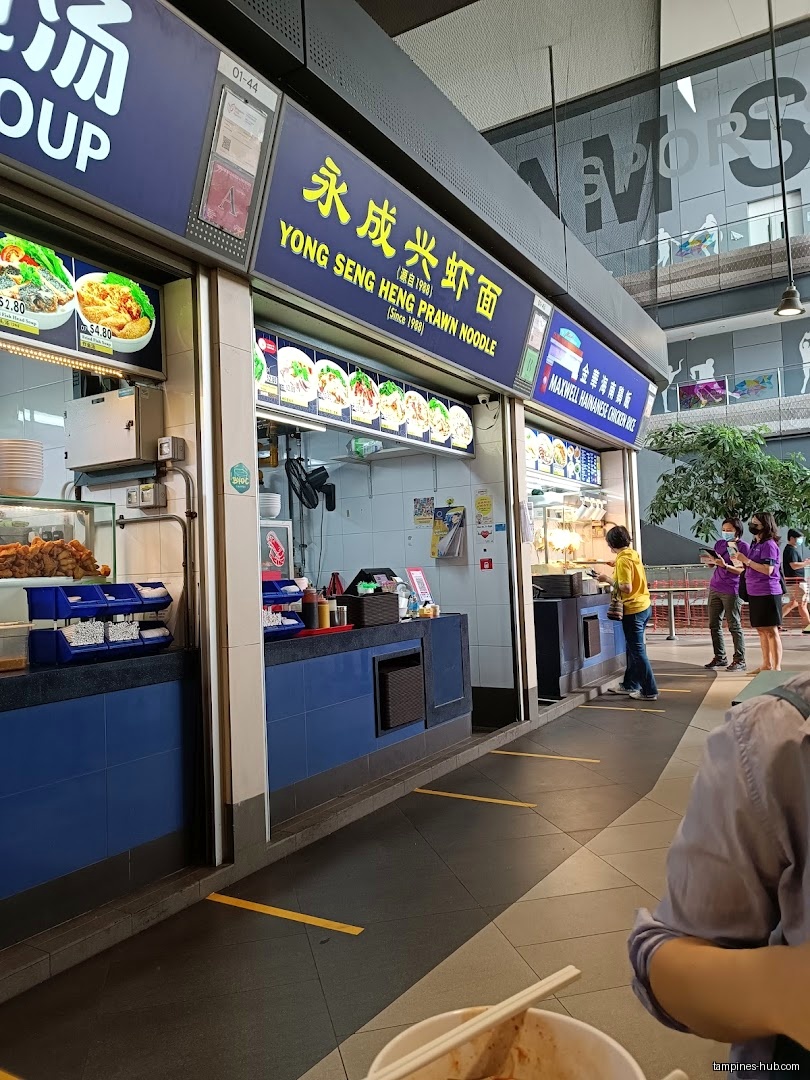 Yong Seng Heng Prawn Noodle shop front with menu and customers.